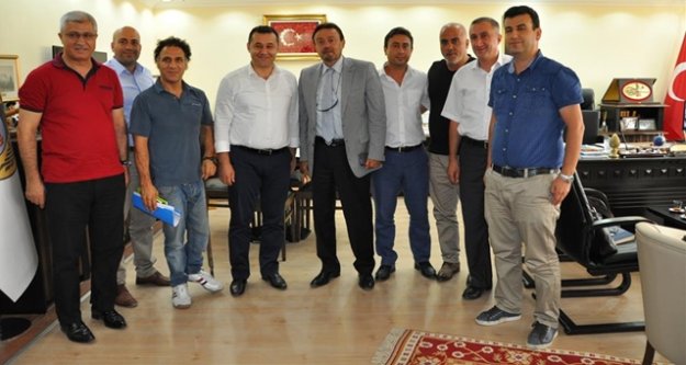 YÜCEL PROTOKOLE İMZAYI ATTI