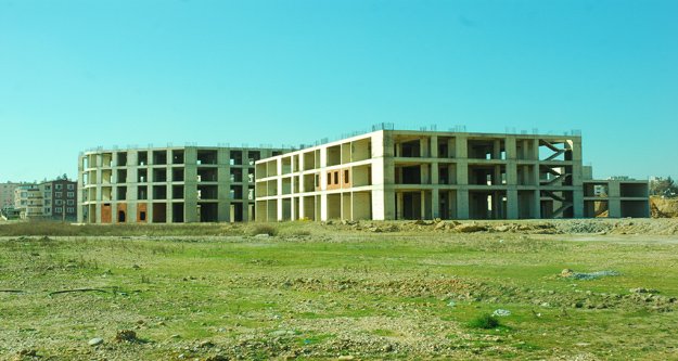 YARIM KALAN HASTANE BİNASI AKDENİZ ÜNİVERSİTESİ'NE DEVREDİLECEK