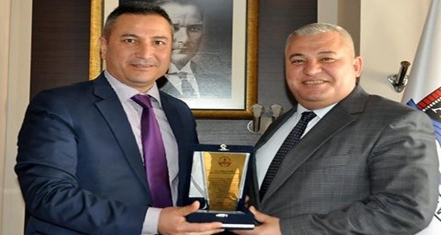 ER’DEN ŞAHİN’E TEŞEKKÜR PLAKETİ