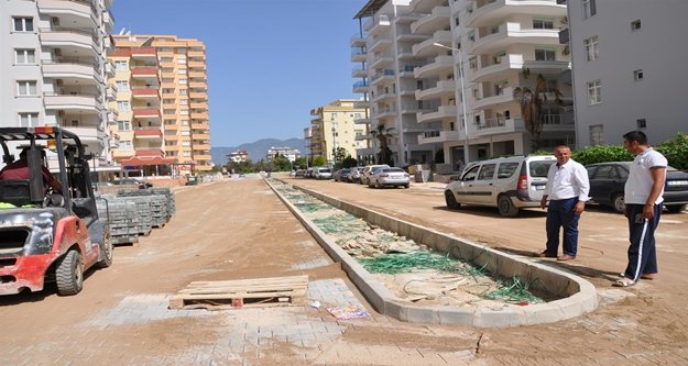 MAHALLELER KALDIRIM VE PARKEYE KAVUŞUYOR