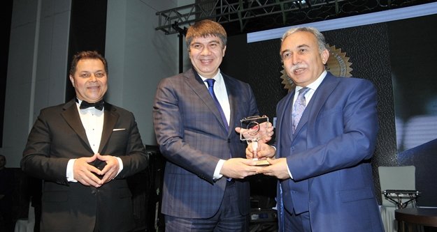 TÜREL'E BAŞARI ÖDÜLÜ