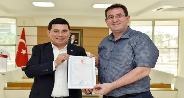 Askeri alan mağdurları tapularını alıyor