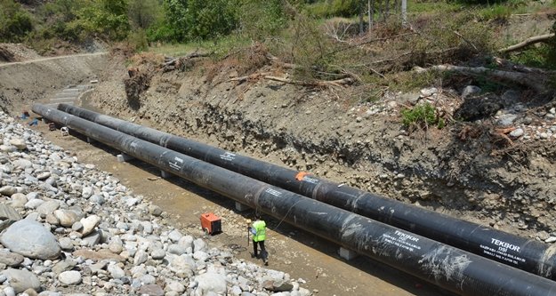 Komşuda sulama çalışmaları sürüyor