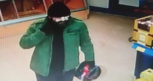 Silahlı soygun anı saniye saniye kameralarda