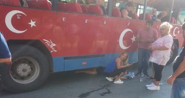 Safari otobüsünün altında kalan kadın ölümden döndü