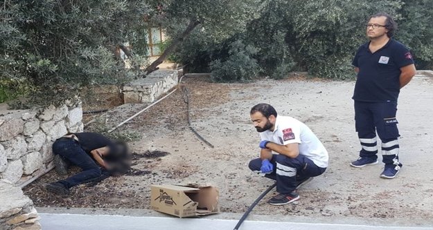 Tuvaletin çatısında elleri ve yüzü yanmış ceset bulundu