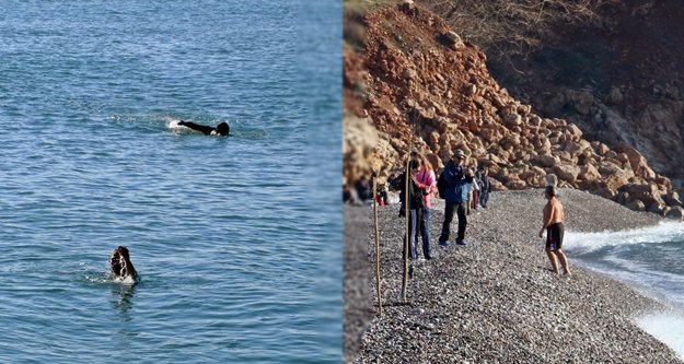 Felaketin ardından güneşi gören denize koştu