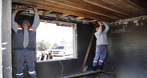 Evi yanan aileye yardım eli geldi
