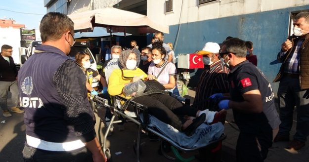 Pazar alışverişi sırasında silahlı kavganın arasında kalan kadın yaralandı