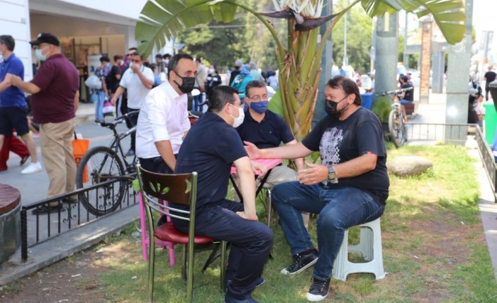 Tütüncü, kapalı yol esnafıyla bir araya geldi