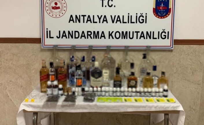 Evinde sahte içki üretirken yakalandı