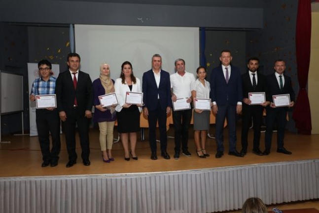Kaymakam Ürkmezer'den Milli Eğitim çalışanlarına başarı belgesi