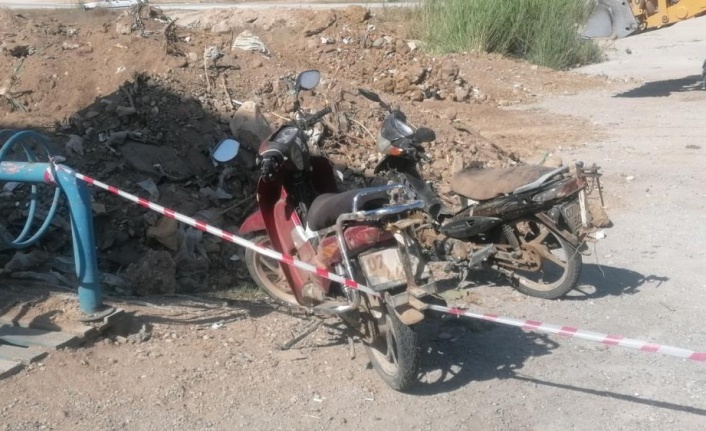 Dökülen hafriyat toprağının altından motosiklet çıktı