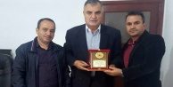 Yanar'dan eski başkana plaket