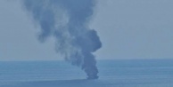 Teknesi yanan Alman turisti sahil güvenlik kurtardı