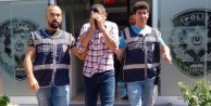 Bir evden battaniye içinde çelik kasa çalan 2 kişi yakalandı