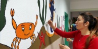 Okul duvarlarını öğretmenler güzelleştiriyor