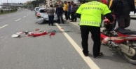 Alanya'da park halindeki araca çarpan kadın motosikletli yaralandı