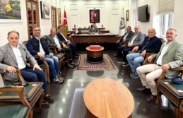 Eski başkanlardan kaymakama ziyaret