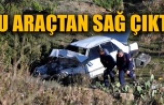 OTOMOBİL 20 METRELİK UÇURUMA YUVARLANDI