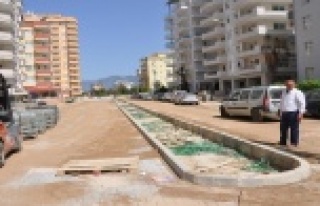 MAHALLELER KALDIRIM VE PARKEYE KAVUŞUYOR