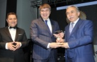 TÜREL'E BAŞARI ÖDÜLÜ