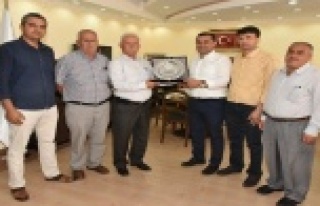 ŞOFÖRLERDEN YÜCEL'E TEŞEKKÜR PLAKETİ