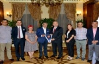 ANTALYA GAZETECİLER CEMİYETİNDEN KARAOĞLU'NA...