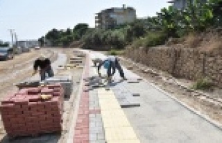 MERKEZ MAHALLELERDE KALDIRIM VE YOL SEFERBERLİĞİ