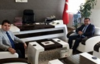 Başkan Yücel yeni kaymakamı ziyaret etti