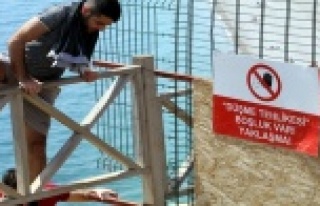 Tatilcilerin deniz aşkı engel tanımadı