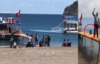 Tatil merkezinde benzin bidonlu çakmaklı iskele...