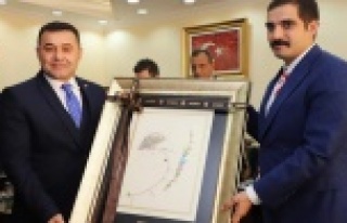 Sinan Ateş'den başkan Yücel'e ziyaret