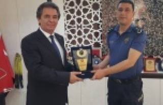 Tokuş'tan Avcı'ya teşekkür plaketi