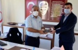 Türkdoğan'dan hem ziyaret hem hediye