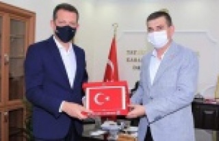 MHP'den kaymakama hayırlı olsun ziyareti