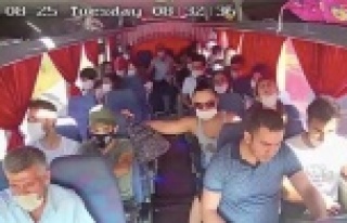 Otobüsün kırmızı ışıkta bekleyen araçları...