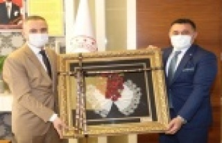 Başkan Yücel’den Müdür Er’e hayırlı olsun...