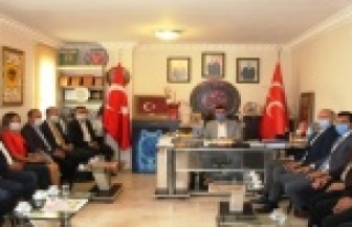 AK Parti’li meclis üyelerinden MHP’ye ziyaret