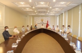 Toklu muhtarlarla buluştu