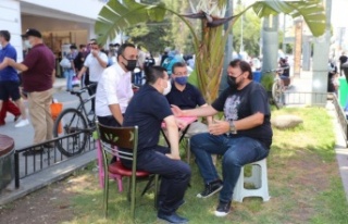 Tütüncü, kapalı yol esnafıyla bir araya geldi