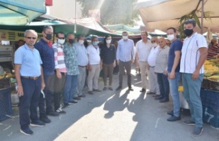 Alanya MHP'den pazar esnafına ziyaret