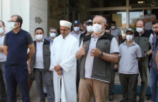 Hayatını kaybeden işçiler için düzenlenen törende...