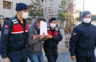 Tutuklanan uyuşturucu taciri, yüzünü tutuklama...