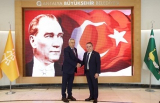 Başkan Böcek, TESK Başkanı Palandöken ile bir...