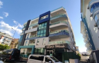 Alanya'da komşularının duvarlarına tehdit...