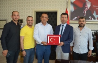 MHP İlçe Yönetimi'nden Başhekime hayırlı...