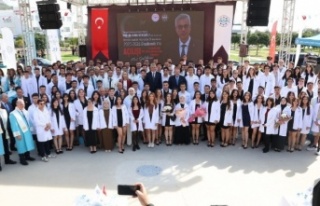 ALKÜ'de bakanlı açılış ve beyaz önlük...