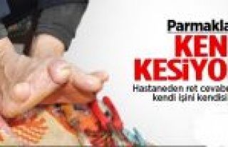 Kendi Parmaklarını Kendi Kesiyor